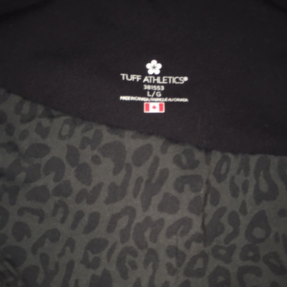 Athletic leggings with dark leopard print. - Picture 2 of 4